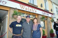 Marty Walsh joins Joan and Cathal Walsh (no relation) outside the shop in the centre of Clifden in Connemara, Co. Galway. Photos by Bill Forry